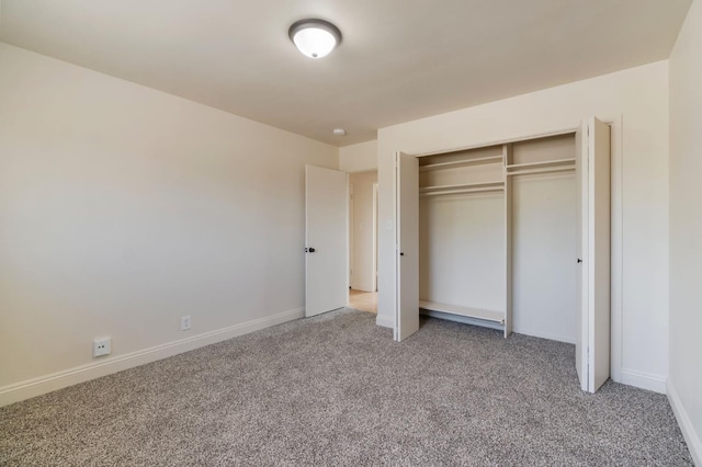 2738 S Fairway Ct, Visalia, CA 93277 - unfurnished bedroom featuring light colored carpet and a closet