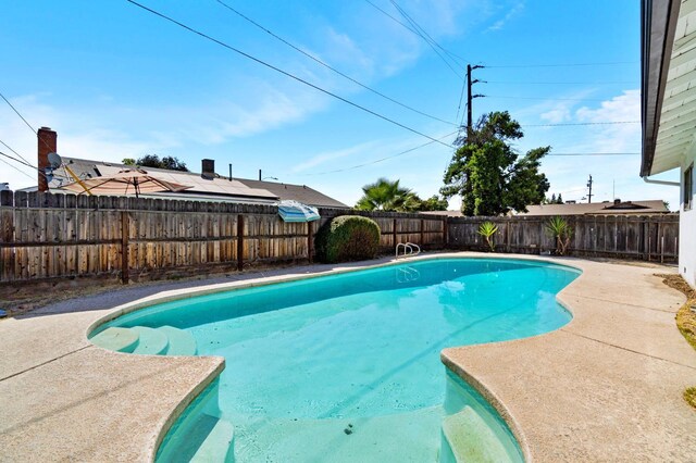 2738 S Fairway Ct, Visalia, CA 93277 - view of swimming pool with a fenced backyard and a patio