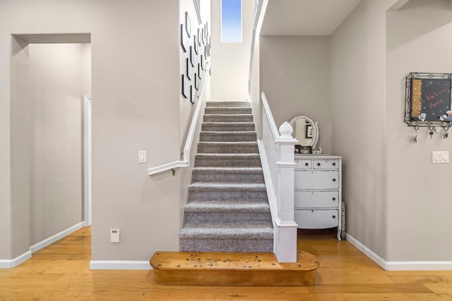 2143 Everglade Ave, Clovis, CA 93619 - staircase with wood finished floors and baseboards