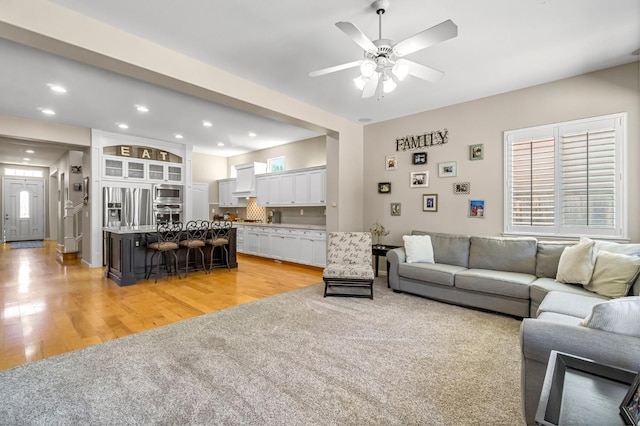 2143 Everglade Ave, Clovis, CA 93619 - living area featuring recessed lighting, ceiling fan, and light wood-type flooring