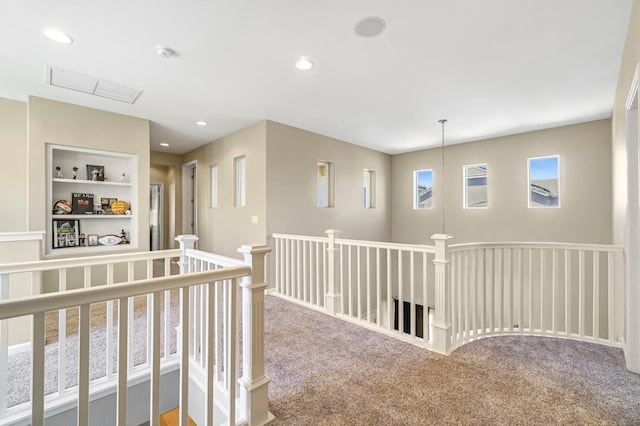 2143 Everglade Ave, Clovis, CA 93619 - hallway featuring carpet, an upstairs landing, built in shelves, and recessed lighting