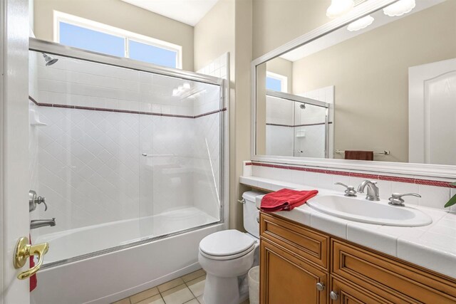 2143 Everglade Ave, Clovis, CA 93619 - full bath with vanity, combined bath / shower with glass door, and tile patterned flooring