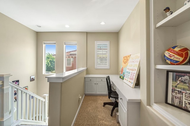 2143 Everglade Ave, Clovis, CA 93619 - home office with healthy amount of natural light, light carpet, and built in study area