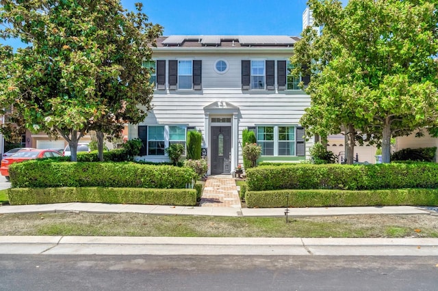 2143 Everglade Ave, Clovis, CA 93619 - view of front of house featuring solar panels and a chimney