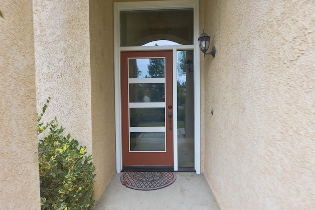 10521 N Doheny Ave, Fresno, CA 93730 - view of exterior entry featuring stucco siding