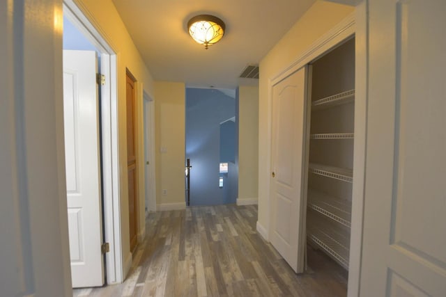 10521 N Doheny Ave, Fresno, CA 93730 - corridor featuring wood finished floors and baseboards