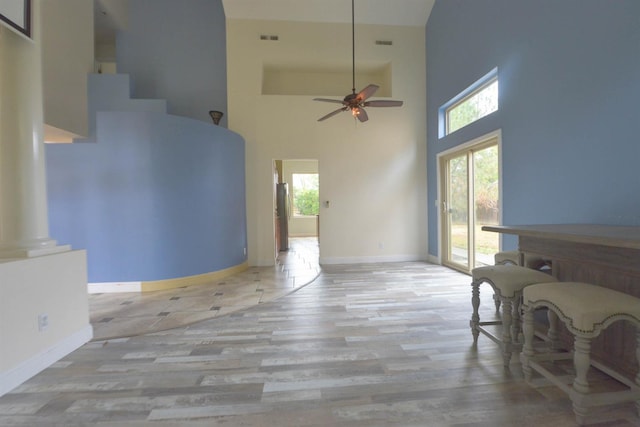 10521 N Doheny Ave, Fresno, CA 93730 - dining area featuring a high ceiling, plenty of natural light, and wood finished floors