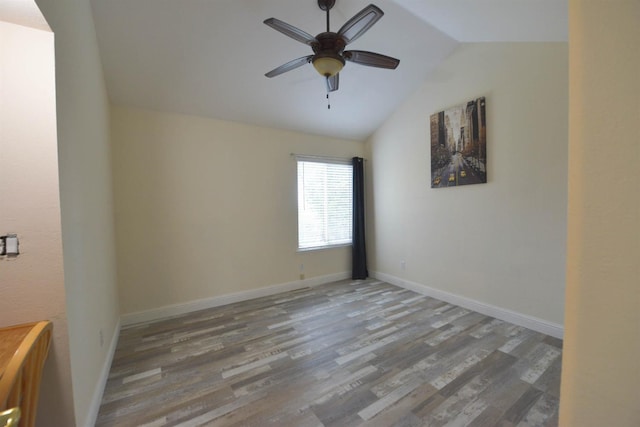 10521 N Doheny Ave, Fresno, CA 93730 - spare room with lofted ceiling, wood finished floors, and ceiling fan