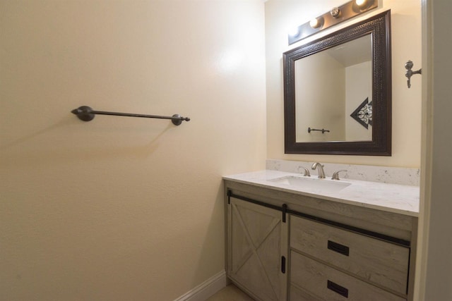 10521 N Doheny Ave, Fresno, CA 93730 - bathroom featuring vanity and baseboards