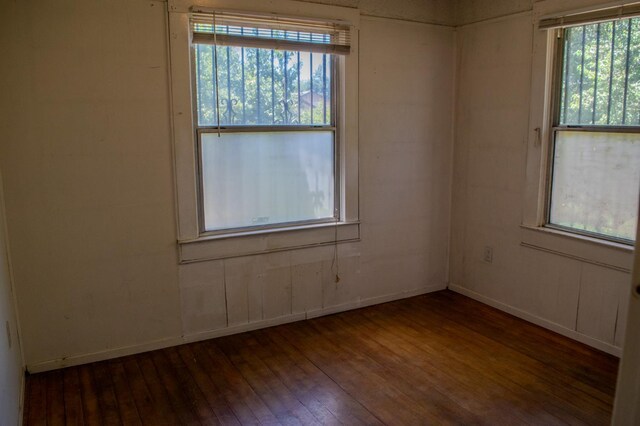 1439 S 4 Th St, Fresno, CA 93702 - spare room featuring wood-type flooring and baseboards