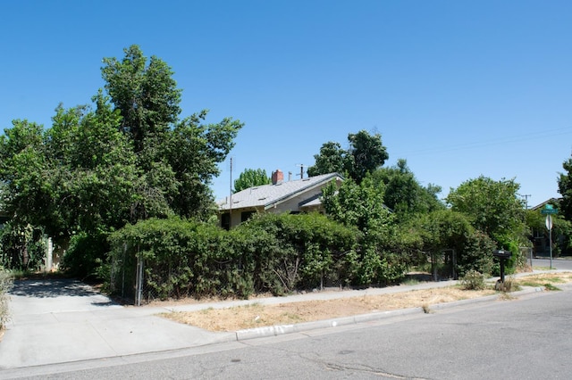 1439 S 4 Th St, Fresno, CA 93702 - view of asphalt road with sidewalks and curbs