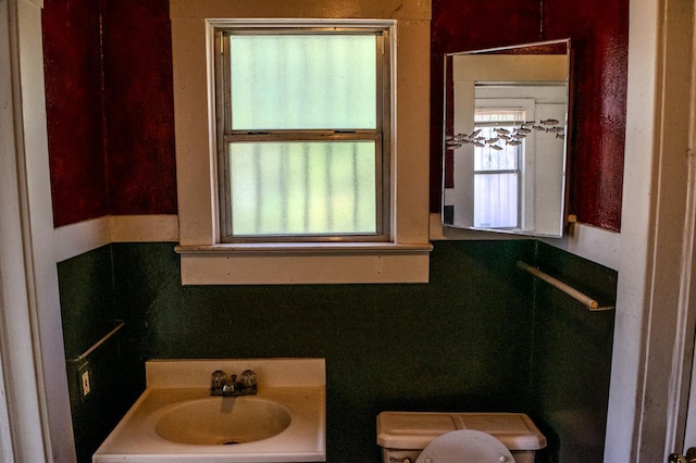 1439 S 4 Th St, Fresno, CA 93702 - half bathroom featuring a sink and toilet