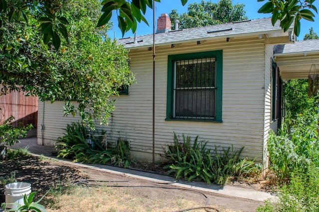 1439 S 4 Th St, Fresno, CA 93702 - view of home's exterior featuring a chimney