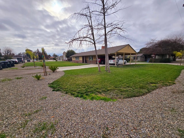 525 N Crenshaw, Visalia, CA 93291 - view of front facade with a front lawn, a chimney, and driveway
