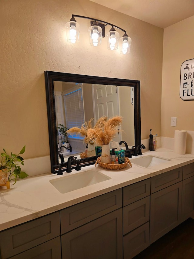 525 N Crenshaw, Visalia, CA 93291 - bathroom with double vanity and a textured wall