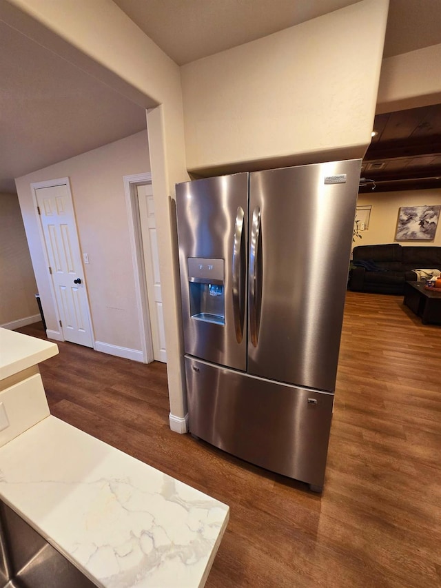 525 N Crenshaw, Visalia, CA 93291 - kitchen view of stainless steel fridge, wood finished floors, and light countertops