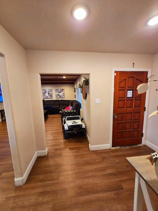 525 N Crenshaw, Visalia, CA 93291 - foyer featuring baseboards and wood finished floors