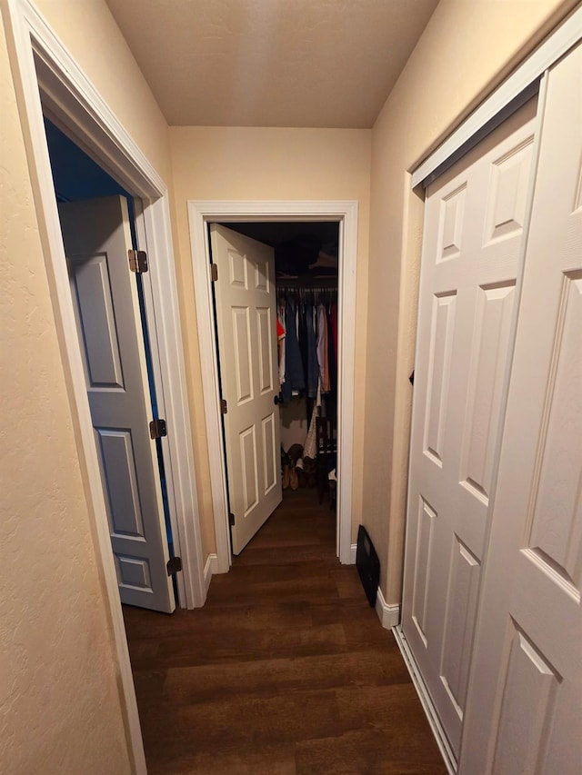 525 N Crenshaw, Visalia, CA 93291 - hall with dark wood-style flooring and baseboards