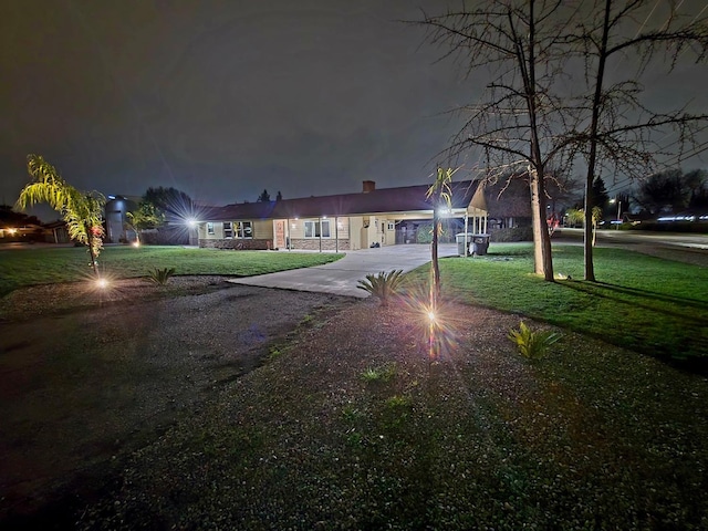 525 N Crenshaw, Visalia, CA 93291 - view of front of house with concrete driveway and a yard
