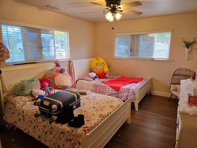 525 N Crenshaw, Visalia, CA 93291 - bedroom with multiple windows, dark wood-style floors, and a ceiling fan