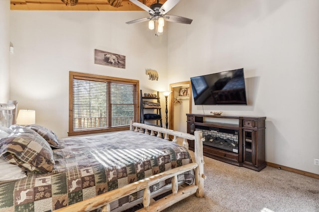 39801 Woody Ln, Shaver Lake, CA 93664 - carpeted bedroom with a high ceiling and a ceiling fan