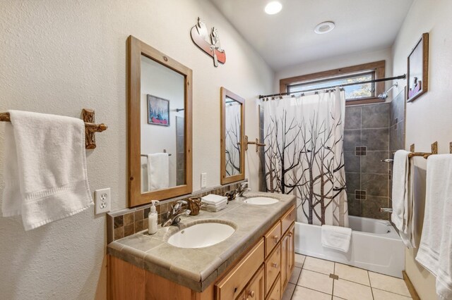 39801 Woody Ln, Shaver Lake, CA 93664 - bathroom featuring double vanity, shower / bath combo with shower curtain, and tile patterned flooring