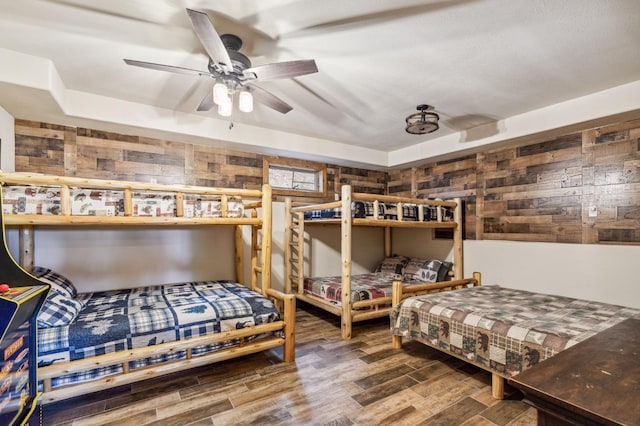 39801 Woody Ln, Shaver Lake, CA 93664 - bedroom featuring wood finished floors and wooden walls