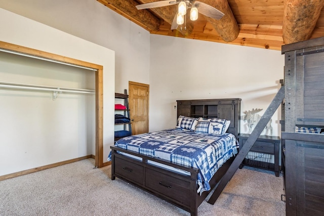 39801 Woody Ln, Shaver Lake, CA 93664 - carpeted bedroom featuring beam ceiling, ceiling fan, and a closet