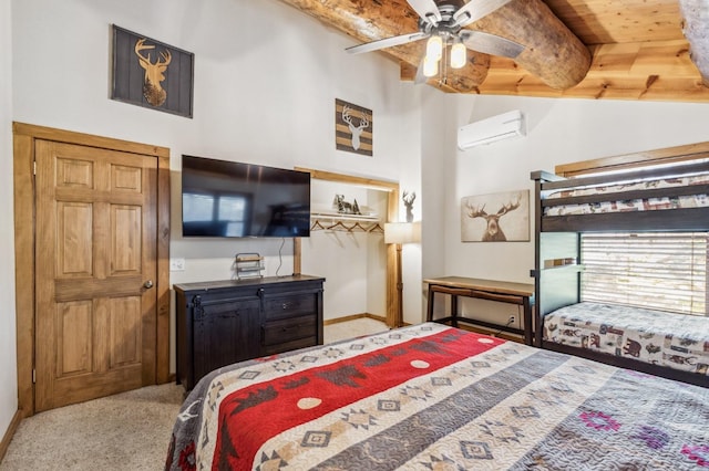 39801 Woody Ln, Shaver Lake, CA 93664 - bedroom featuring light carpet, a wall unit AC, and a ceiling fan