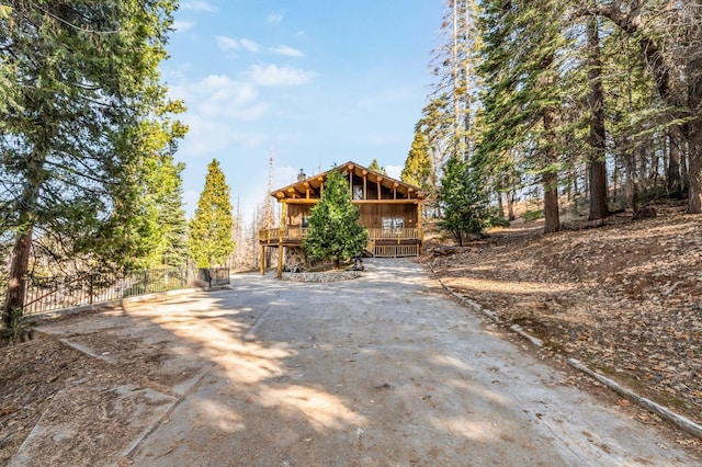 39801 Woody Ln, Shaver Lake, CA 93664 - view of front facade featuring a wooden deck