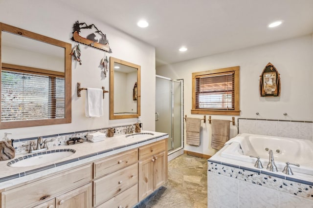 39801 Woody Ln, Shaver Lake, CA 93664 - full bathroom featuring a stall shower, healthy amount of natural light, double vanity, a whirlpool tub, and recessed lighting