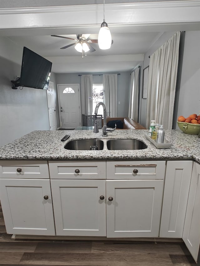 375 W Fir Ave, Pinedale, CA 93650 - kitchen with white cabinetry, a ceiling fan, light stone countertops, and dark wood-style floors