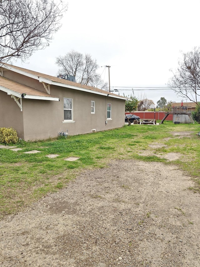 375 W Fir Ave, Pinedale, CA 93650 - view of home's exterior with stucco siding