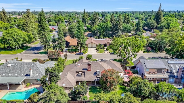 1721 W Wrenwood Ave, Fresno, CA 93711 - aerial perspective of suburban area with a pool and a forest