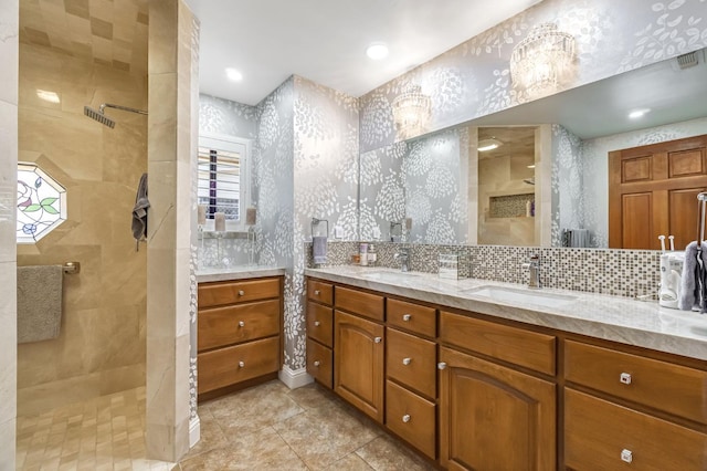 1721 W Wrenwood Ave, Fresno, CA 93711 - full bathroom with double vanity, a walk in shower, tile patterned flooring, and backsplash