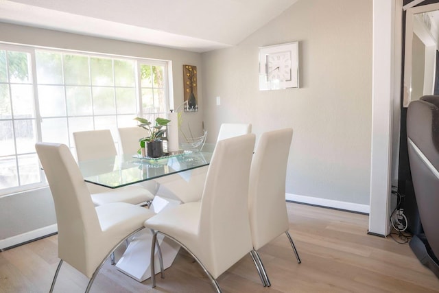 1413 W Fountain Way, Fresno, CA 93705 - dining area with lofted ceiling and light wood-style flooring