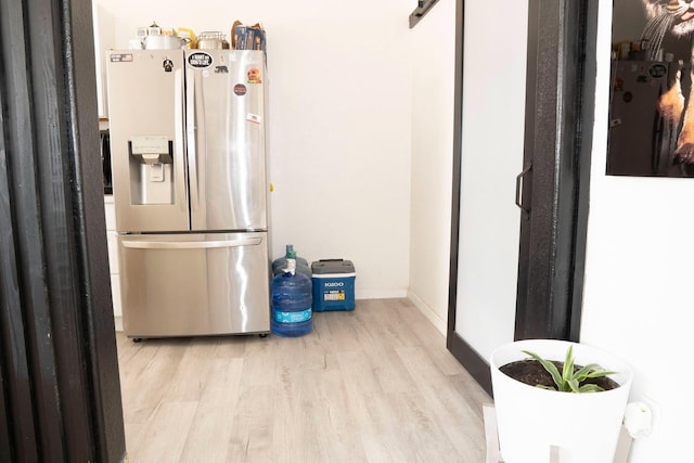 1413 W Fountain Way, Fresno, CA 93705 - kitchen with stainless steel fridge with ice dispenser and wood finished floors