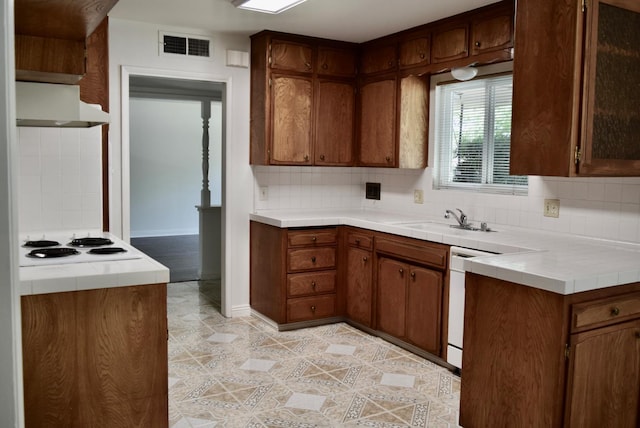 6061 N 9th St, Fresno, CA 93710 - kitchen featuring range hood, decorative backsplash, tile countertops, white appliances, and open shelves