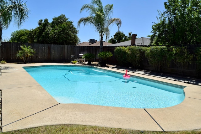 6061 N 9th St, Fresno, CA 93710 - view of pool with a fenced backyard