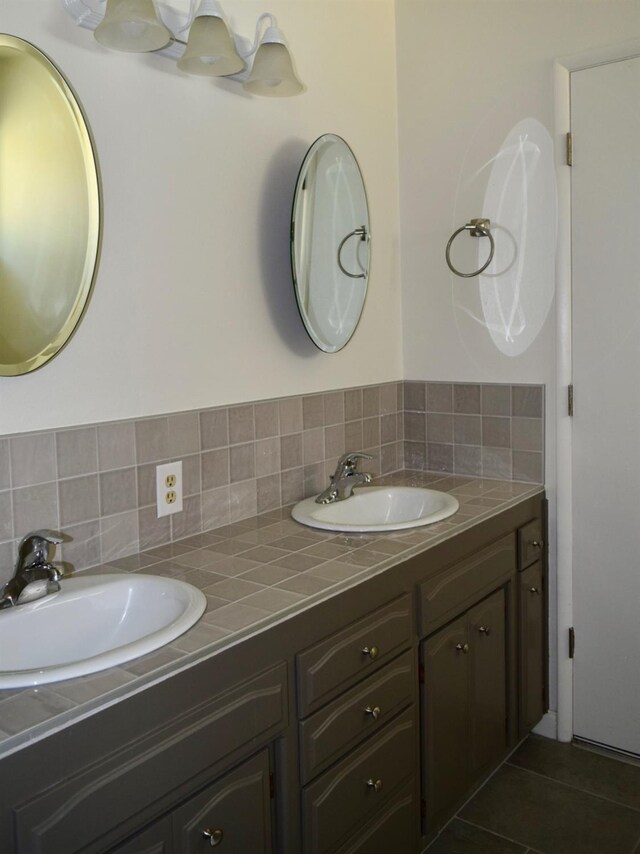 6061 N 9th St, Fresno, CA 93710 - full bathroom featuring double vanity and tasteful backsplash