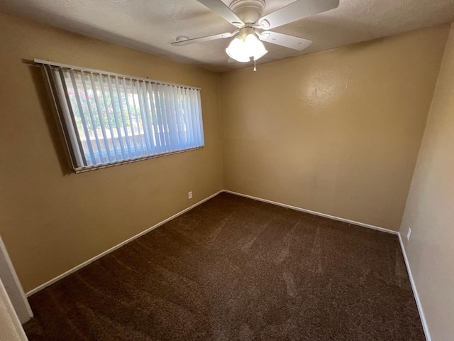 4308 N Cedar Ave, Fresno, CA 93726 - unfurnished room with dark colored carpet and a ceiling fan