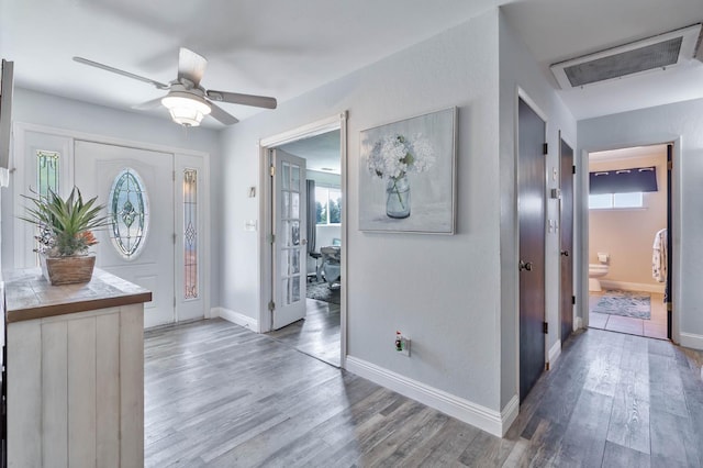 6589 N De Wolf Ave N, Clovis, CA 93619 - entryway with wood finished floors, plenty of natural light, and ceiling fan