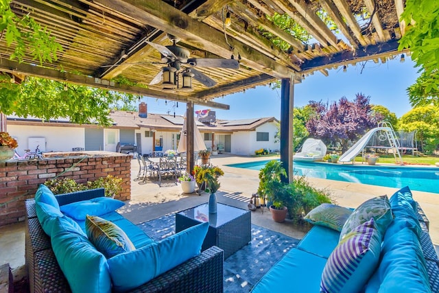6589 N De Wolf Ave N, Clovis, CA 93619 - view of patio featuring an outdoor hangout area, ceiling fan, and a pergola