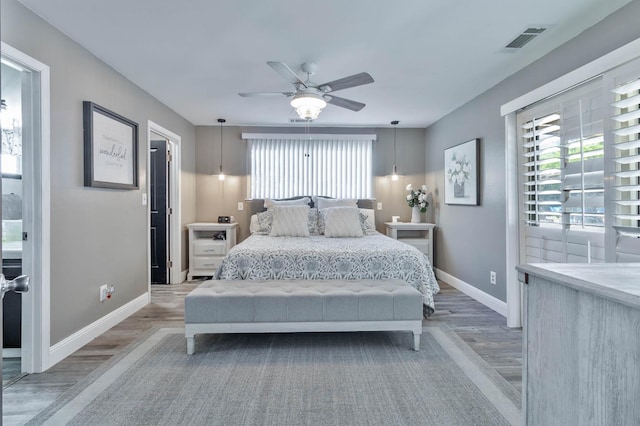 6589 N De Wolf Ave N, Clovis, CA 93619 - bedroom featuring wood finished floors and ceiling fan