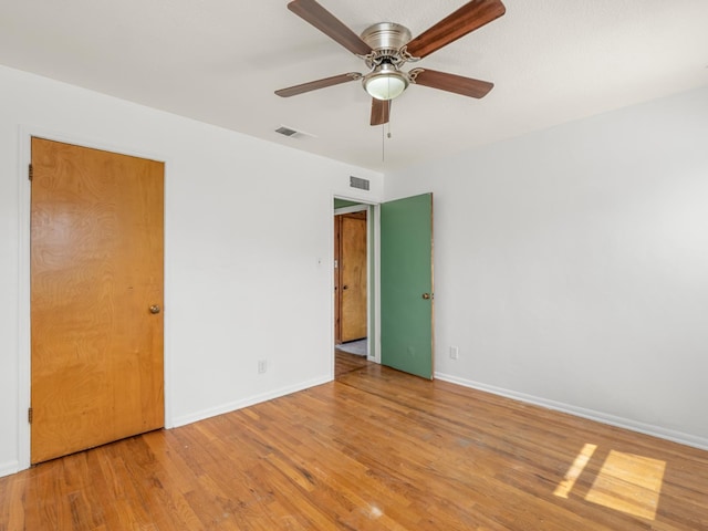 2845 N Adoline Ave, Fresno, CA 93705 - unfurnished bedroom with wood finished floors and ceiling fan