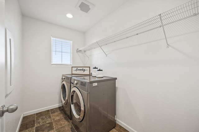 7141 N Shiraz Ave, Fresno, CA 93722 - laundry area with washing machine and clothes dryer and baseboards