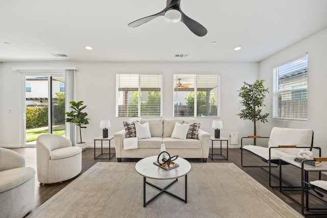 7141 N Shiraz Ave, Fresno, CA 93722 - living room featuring a ceiling fan, wood finished floors, and recessed lighting