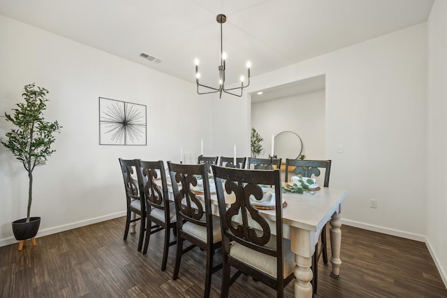 7141 N Shiraz Ave, Fresno, CA 93722 - dining space with a chandelier and dark wood-type flooring
