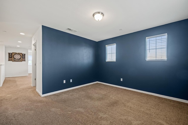7141 N Shiraz Ave, Fresno, CA 93722 - carpeted empty room featuring baseboards and recessed lighting