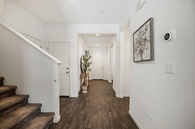 7141 N Shiraz Ave, Fresno, CA 93722 - hallway with stairway and dark wood-style flooring
